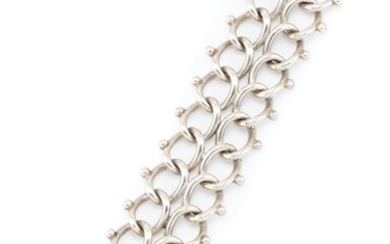 A VINTAGE STERLING SILVER BRACELET; twin curb link with bead edges to pin clasp, size 3 x 18cm, wt. 64g.
