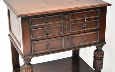 A Victorian oak three-drawer side table with moulded top above...