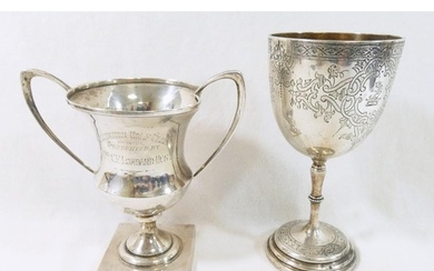 A Victorian silver chalice, London 1882, with engraved desig...