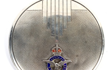 A WWII Art Deco style silver hallmarked compact with RAF badge. Missing internal glass