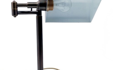 A banker's style desk lamp, late 20th Century, the adjustable shade on extending arm, with cylindrical stem on circular base, 38cm high It is the buyer's responsibility to ensure that electrical items are professionally rewired for use