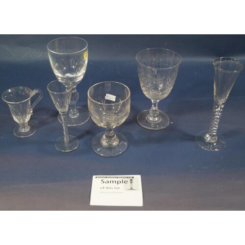 A collection of 19th century glasses with etched floral deta...
