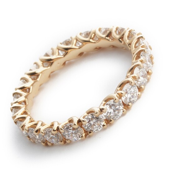 A diamond eternity ring set with numerous brilliant-cut diamonds weighing a total of app. 2.39 ct., mounted in 18k pink gold. G-H/VS-SI. Size 54.