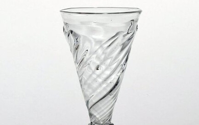 A dwarf ale glass c.1740, the drawn trumpet bowl with...