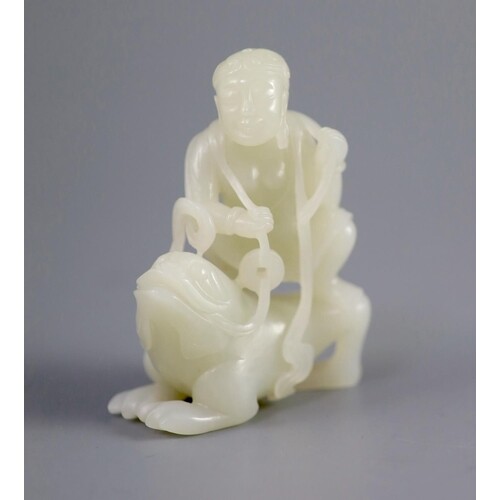 A good Chinese pale celadon jade group of Liu Hai and the th...