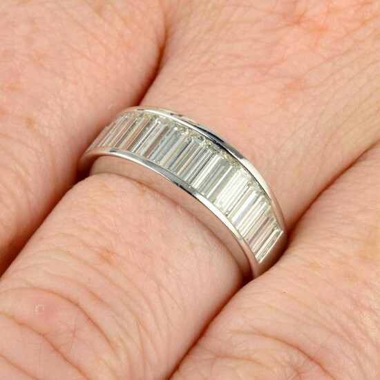 A graduated baguette-cut diamond half eternity ring.