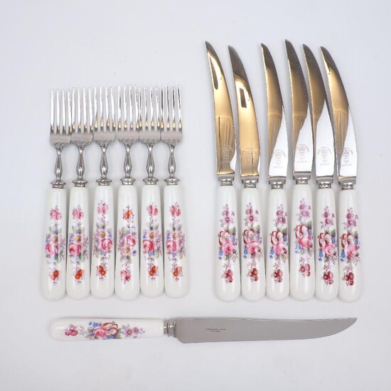 A group of Royal Crown Derby flatware, 20th Century, the handles decorated with floral sprays, comprising six serrated knives, 22cm long, six forks, 18cm long, and a larger serrated knife, 26cm long (13)