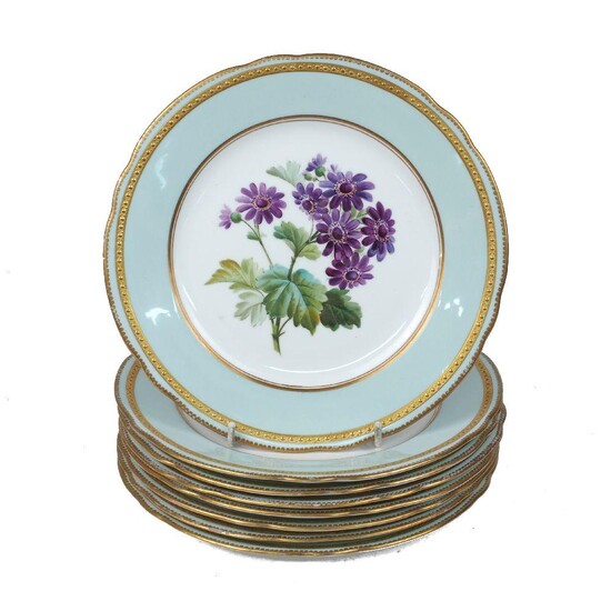 A group of eight Victorian dessert plates, c.1870, each hand painted to the centre with floral studies, with pale green border and gilt rims, each numbered 274 to the underside, each plate 23cm diameter (8)