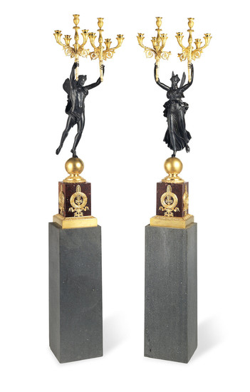 A large pair of French 19th century gilt and patinated bronze eight light candelabra