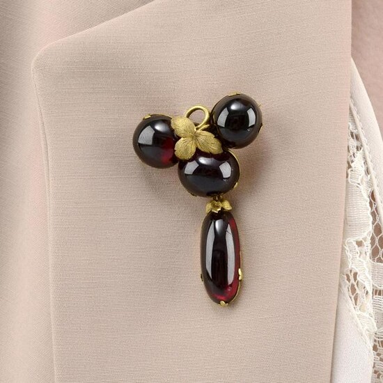 A late 19th century garnet cabochon brooch.May also be