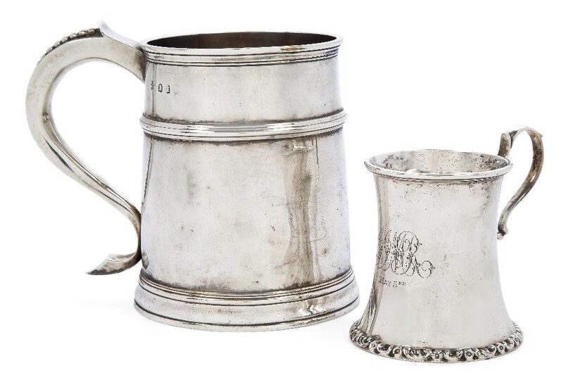 A late 19th/ early 20th century Britannia silver mug, by Charles Stuart Harris, designed with beaded scroll handle, 12.7cm high (inc. handle) and an Edwardian silver christening cup, Birmingham, 1908, William Aitken, with flared body, double scroll...