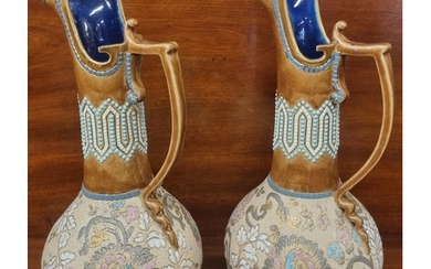 A lovely pair of 19th Century Royal Doulton salt glaze Ewers...
