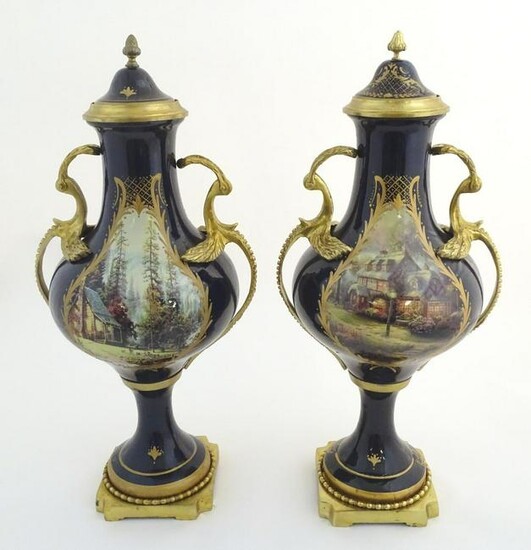 A matched pair of Sevres style lidded urn garnitures on