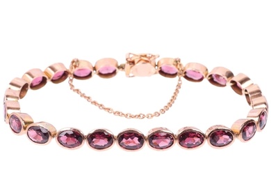 A modern 9ct rose gold garnet tennis line bracelet, maker SA...