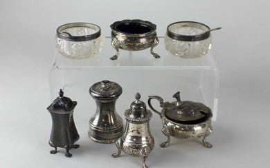 A modern silver three piece cruet set