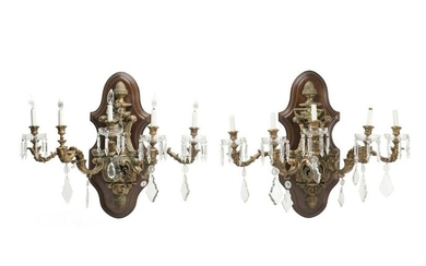 A pair of French Louis XV-style wall sconces