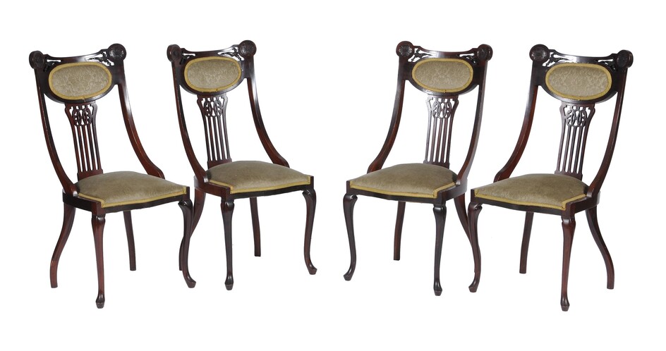 A pair of George II style carved mahogany side chairs