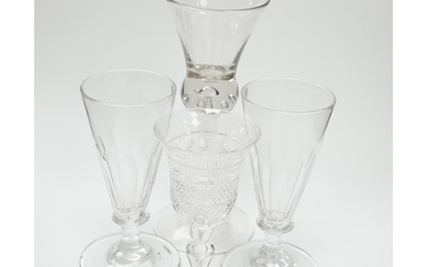 A pair of early 19th century dwarf ale glasses with fluted c...