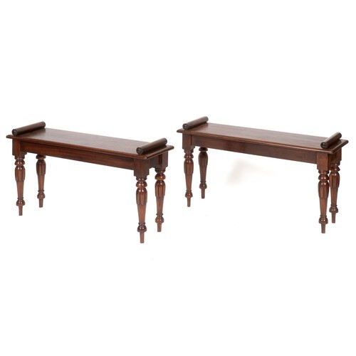 A pair of mahogany window seats, on turned tapering carved l...