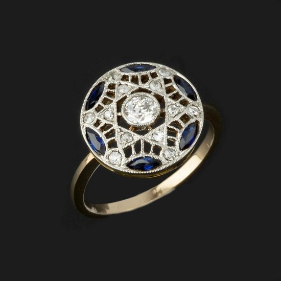 A sapphire and diamond panel ring