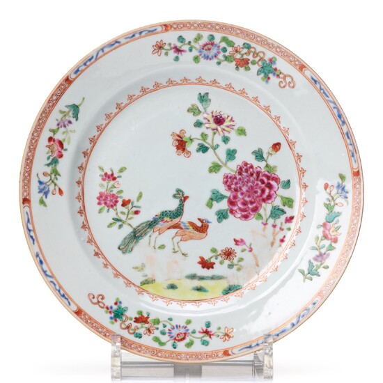 A set of nine famille rose 'double peacock' dinner plates, Qing dynasty, Qianlong (1736-95).