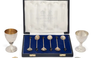 A set of six silver coffee spoons with coffee bean terminals. Mappin...
