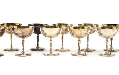 A set of twelve silver champagne goblets