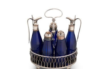 A silver plated 5 bottle cruet stand with unusual blue glass bottles