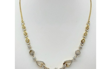 A very elegant 14 K yellow gold necklace with a beautiful de...