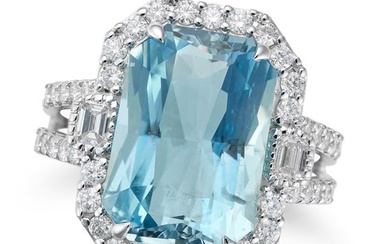 AN AQUAMARINE AND DIAMOND DRESS RING set with an octagonal step cut aquamarine of approximately 8.43