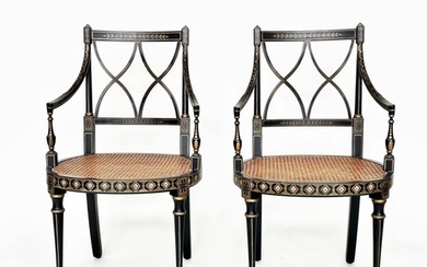 ARMCHAIRS, a pair, Regency style black lacquered and gilt pa...