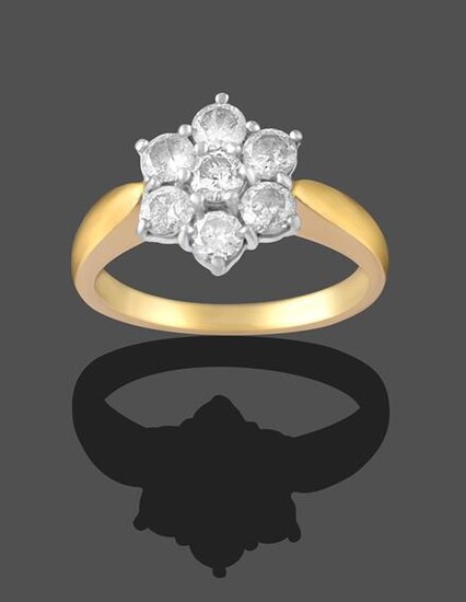 An 18 Carat Gold Diamond Cluster Ring, seven round brilliant...