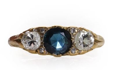 An 18ct gold sapphire and diamond three stone ring