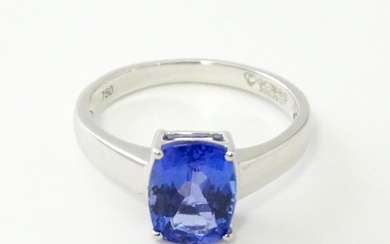 An 18ct white gold ring set with tanzanite. Ring size approx...