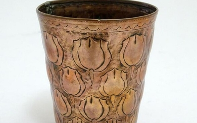 An Arts and Crafts copper beaker of tapering form with