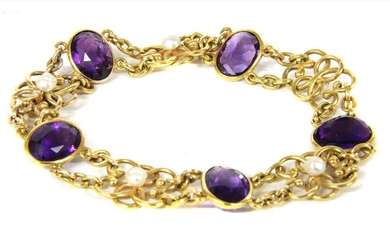 An Edwardian gold amethyst and pearl bracelet