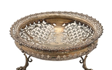 An Edwardian saw pierced silver fruit bowl, with gadrooned r...