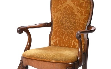 An George II style carved walnut and upholstered open armcha...