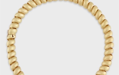 An eighteen karat gold reversible necklace designed as a...