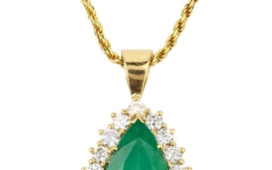 An emerald and diamond pendant, the mixed cut pear shaped...