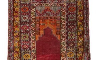 Anatolian Prayer Rug, circa 1900 The crimson field beneath a...
