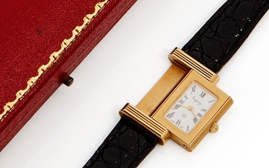 Asprey, Reversible, vers 1980 Une belle et précieuse montre de dame rectangulaire réversible en or,...