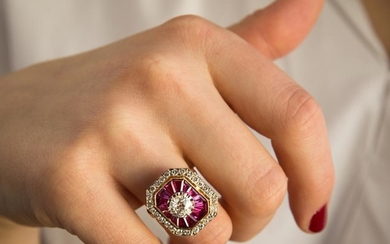 BAGUE DIAMANTS ET RUBIS CALIBRES A 1,01 carat diamond, ruby and gold ring.