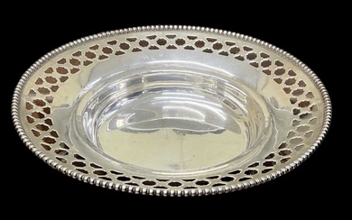 BIGELOW, KENNARD & CO; a sterling silver circular pierced dish,...