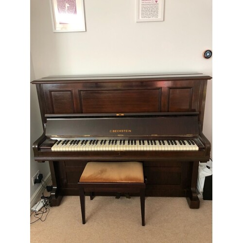 Bechstein (c1905) A Model 9 upright piano in a rosewood case...