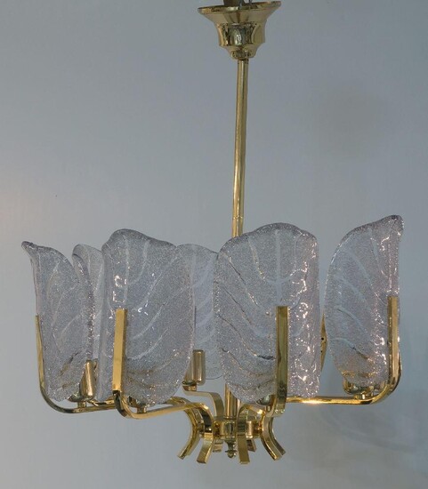 Carl Fagerlund (1915-2011) for Orrefors, an eight light chandelier, circa 1960, the brass frame with six acanthus form glass diffusers, 72cm high Please Note - Two diffusers are damaged and unusable It is the buyer's responsibility to ensure that...