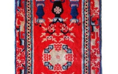 Carpet - Wool - A NINGXIA ‘AUSPICIOUS OBJECTS’ SADDLECLOTH, QING - China - Qing Dynasty (1644-1911)
