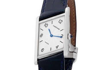 Cartier Paris. Fine and Limited Edition Asymmetrical Wristwatch in Platinum, With Guillochè Arabic Numerals Dial and Papers