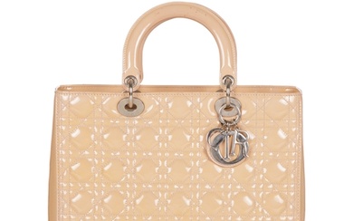 Christian Dior, a Lady Dior GM handbag, designed with the ma...