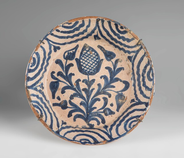 Dish from the Opium Poppy Series. Talavera de la Reina, 18th century. Glazed ceramic. Measurements:...